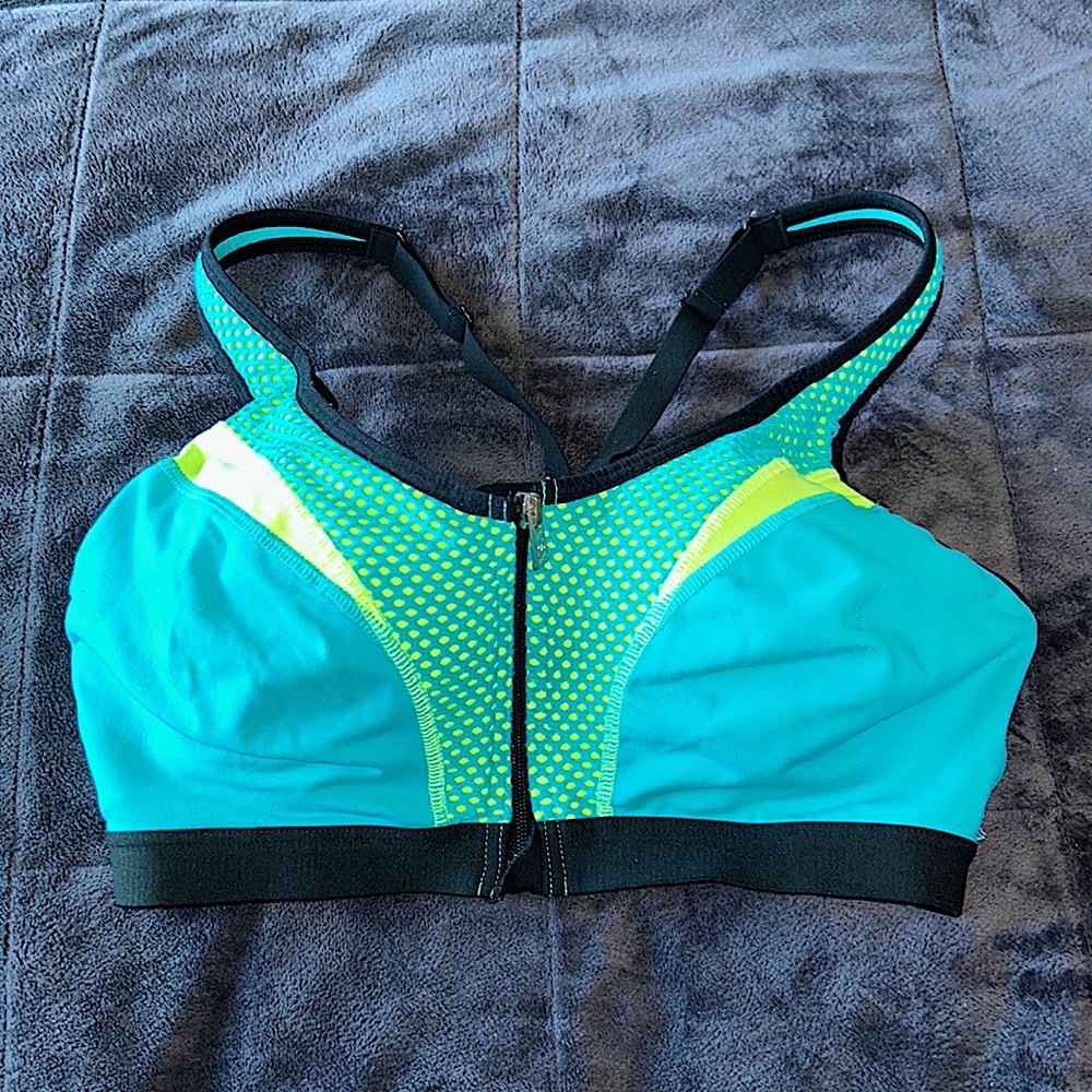 A VSX blue sports bra with a light pad inside.